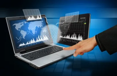 Laptop displaying business growth analytics representing the operational benefits of managed IT services.
